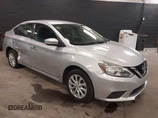 2019 Nissan Sentra S z VIN 3N1AB7APXKY353974, wystawiony jako IAAI lot #42311872 z przebiegiem 101 854 mil mil oraz . Historia ofert i sprzedaży dostępna na DreamBid. Obrazek 1.