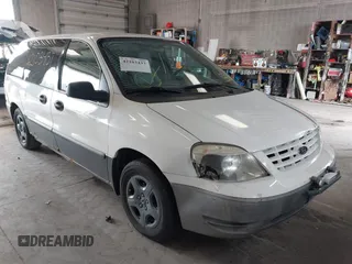 2006 Ford Freestar Cargo with VIN 2FTZA54666BA14556, listed as a IAAI auction lot 42103437 with 147,998 mi miles. Bid and sale history available at carsss.com. Image 6.