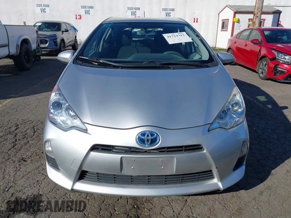 2014 Toyota Prius One z VIN JTDKDTB32E1574607, wystawiony jako IAAI lot #41724312 z przebiegiem 102 612 mil mil oraz . Historia ofert i sprzedaży dostępna na DreamBid. Obrazek 12.