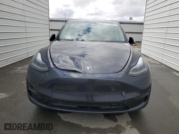 2024 Tesla Model Y with VIN 7SAYGDED4RF017614, listed as a Copart auction lot 45754675 with 11,209 mi miles and Salvage title. Bid and sale history available at DreamBid. Image 5.