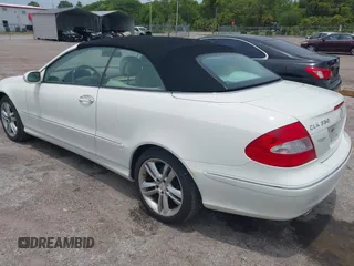 2008 Mercedes-Benz CLK 3.5L with VIN WDBTK56G98F236825, listed as a IAAI auction lot 42193752 with 127,318 mi miles. Bid and sale history available at carsss.com. Image 3.