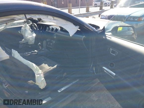 2018 Ford Mustang GT z VIN 1FA6P8CF3J5182601, wystawiony jako IAAI lot #41661225 z przebiegiem 67 898 mil mil oraz . Historia ofert i sprzedaży dostępna na DreamBid. Obrazek 5.