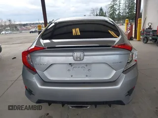 2021 Honda Civic Sport with VIN 2HGFC2F83MH521470, listed as a IAAI auction lot 41828890 with 49,703 mi miles and . Bid and sale history available at DreamBid. Image 16.