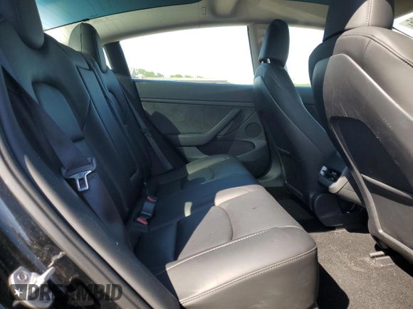 2023 Tesla Model 3 z VIN 5YJ3E1EA1PF547070, wystawiony jako Copart lot #55793205 z przebiegiem 38 591 mil mil oraz Szkoda całkowita • Salvage title. Historia ofert i sprzedaży dostępna na DreamBid. Obrazek 10.