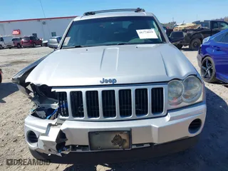 2007 Jeep Grand Cherokee Laredo with VIN 1J8HR48P87C687411, listed as a IAAI auction lot 41774029 with 212,763 mi miles. Bid and sale history available at carsss.com. Image 13.