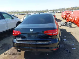 2015 Volkswagen Jetta SE z VIN 3VWD17AJ2FM318882, wystawiony jako IAAI lot #42041914 z przebiegiem 97 623 mil mil oraz . Historia ofert i sprzedaży dostępna na DreamBid. Obrazek 16.