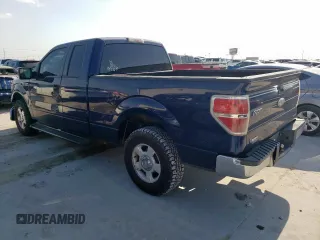 2012 Ford F-150 XL with VIN 1FTEX1CM7CFA40227, listed as a Copart auction lot 53335815 with 150,742 mi miles and Salvage Title. Bid and sale history available at DreamBid. Image 2.