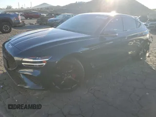 2023 Genesis G70 3.3T with VIN KMTG54TE1PU106881, listed as a Copart auction lot 83988384 with 70,698 mi miles and Salvage Title. Bid and sale history available at carsss.com. Image 1.