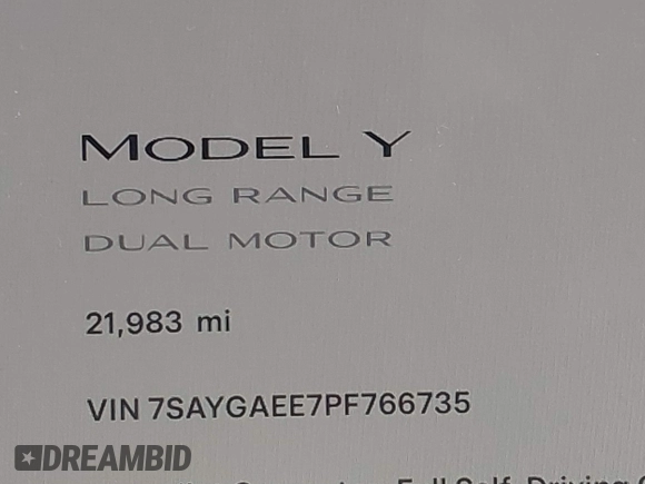 2023 Tesla Model Y Long Range with VIN 7SAYGAEE7PF766735, listed as a IAAI auction lot 41626651 with 21,983 mi miles. Bid and sale history available at carsss.com. Image 16.