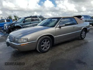 2000 Cadillac Eldorado z VIN 1G6EL12Y7YB703863, wystawiony jako Copart lot #85433244 z przebiegiem 175 416 mil mil oraz Szkoda całkowita • Salvage title. Historia ofert i sprzedaży dostępna na DreamBid. Obrazek 1.