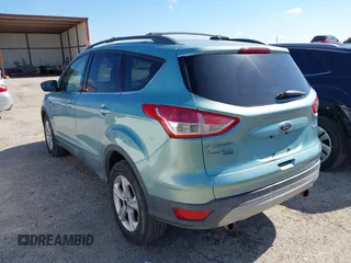 2013 Ford Escape SE with VIN 1FMCU0GX6DUA85991, listed as a IAAI auction lot 42222248 with 136,457 mi miles and . Bid and sale history available at DreamBid. Image 3.