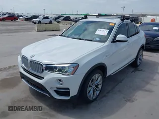 2018 BMW X4 xDrive28i z VIN 5UXXW3C52J0T82067, wystawiony jako IAAI lot #42032671 z przebiegiem 101 331 mil mil oraz . Historia ofert i sprzedaży dostępna na DreamBid. Obrazek 2.