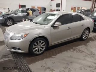 2013 Chevrolet Malibu LTZ with VIN 1G11H5SAXDF236151, listed as a IAAI auction lot 41720812 with 181,159 mi miles. Bid and sale history available at carsss.com. Image 2.