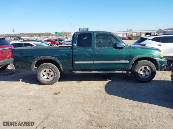2004 Toyota Tundra SR5 with VIN 5TBRT34114S448987, listed as a IAAI auction lot 41763720 with 228,203 mi miles. Bid and sale history available at carsss.com. Image 14.