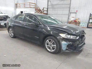 2015 Ford Fusion Titanium Hybrid with VIN 3FA6P0RU2FR309074, listed as a IAAI auction lot 41240630 with 172,025 mi miles. Bid and sale history available at carsss.com. Image 1.