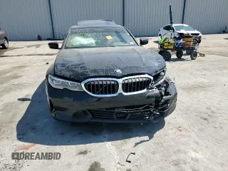 2020 BMW 3 Series 330i z VIN 3MW5R1J02L8B18977, wystawiony jako Copart lot #57972275 z przebiegiem Nie podano mil oraz Nie do naprawy • Non repairable. Historia ofert i sprzedaży dostępna na DreamBid. Obrazek 13.