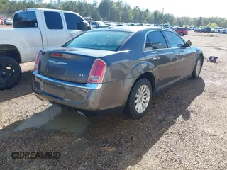 2014 Chrysler 300 with VIN 2C3CCAAG2EH327934, listed as a IAAI auction lot 41875056 with 241,599 mi miles. Bid and sale history available at carsss.com. Image 4.