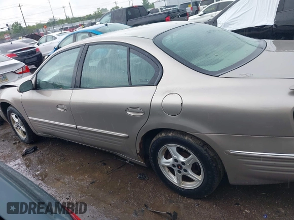 2001 Pontiac Bonneville SE z VIN 1G2HX54K814258899, wystawiony jako IAAI lot #42260783 z przebiegiem 165 869 mil mil oraz . Historia ofert i sprzedaży dostępna na DreamBid. Obrazek 14.