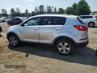 2013 Kia Sportage LX with VIN KNDPBCA24D7521374, listed as a Copart auction lot 61654725 with 146,378 mi miles and Salvage title. Bid and sale history available at DreamBid. Image 2.