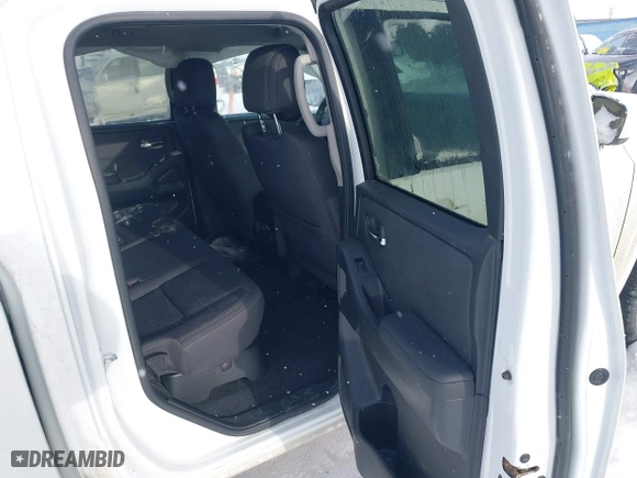 2023 Nissan Frontier PRO-4X with VIN 1N6ED1EK0PN644649, listed as a IAAI auction lot 41496852 with 26,318 mi miles. Bid and sale history available at carsss.com. Image 8.