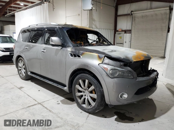 2013 Infiniti QX56 z VIN JN8AZ2NF2D9550941, wystawiony jako Copart lot #70451624 z przebiegiem Nie podano mil oraz Szkoda całkowita • Salvage title. Historia ofert i sprzedaży dostępna na DreamBid. Obrazek 4.