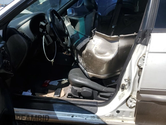 1999 Subaru Legacy Outback with VIN 4S3BG6855X7645042, listed as a Copart auction lot 55452095 with 159,874 mi miles and Salvage title. Bid and sale history available at DreamBid. Image 7.