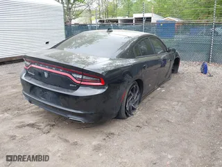 2016 Dodge Charger SXT with VIN 2C3CDXHG6GH332854, listed as a IAAI auction lot 42094761 with 114,883 mi miles. Bid and sale history available at carsss.com. Image 4.