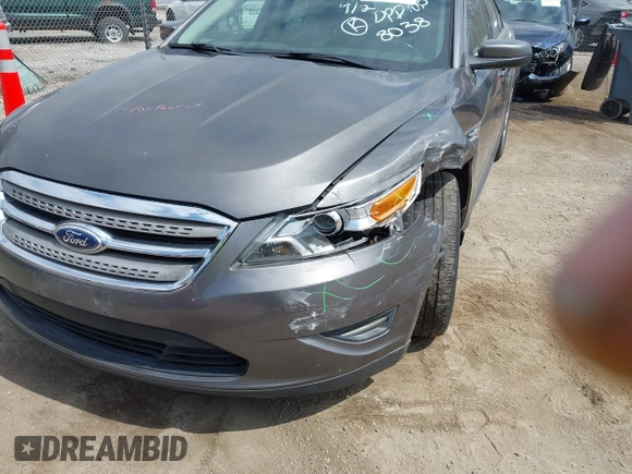 2012 Ford Taurus SEL z VIN 1FAHP2EWXCG138038, wystawiony jako IAAI lot #42007614 z przebiegiem 155 045 mil mil oraz . Historia ofert i sprzedaży dostępna na DreamBid. Obrazek 13.