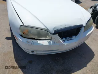 2004 Hyundai Elantra GLS z VIN KMHDN46D64U808402, wystawiony jako IAAI lot #42341726 z przebiegiem Nie podano mil oraz . Historia ofert i sprzedaży dostępna na DreamBid. Obrazek 6.