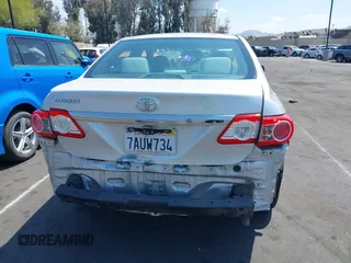 2013 Toyota Corolla L with VIN 5YFBU4EE3DP207633, listed as a IAAI auction lot 42131218 with 89,899 mi miles and . Bid and sale history available at DreamBid. Image 17.