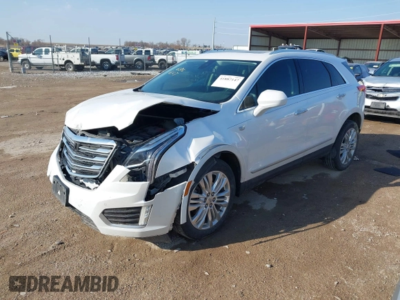 2017 Cadillac XT5 Premium Luxury AWD z VIN 1GYKNERS3HZ284561, wystawiony jako IAAI lot #41887147 z przebiegiem 119 189 mil mil oraz . Historia ofert i sprzedaży dostępna na DreamBid. Obrazek 2.