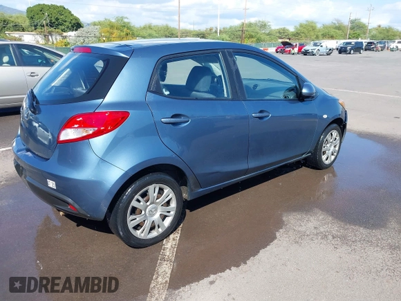 2014 Mazda 2 Sport with VIN JM1DE1KY0E0181555, listed as a IAAI auction lot 41539841 with 121,918 mi miles and . Bid and sale history available at DreamBid. Image 4.