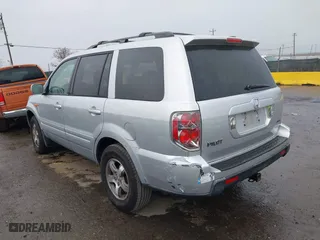 2006 Honda Pilot EX-L with RES with VIN 2HKYF18636H515182, listed as a IAAI auction lot 41811646 with 198,820 mi miles. Bid and sale history available at carsss.com. Image 3.