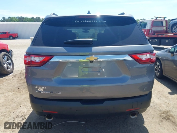 2021 Chevrolet Traverse LT Cloth z VIN 1GNEVGKW8MJ193233, wystawiony jako IAAI lot #42279421 z przebiegiem 66 924 mil mil oraz . Historia ofert i sprzedaży dostępna na DreamBid. Obrazek 15.