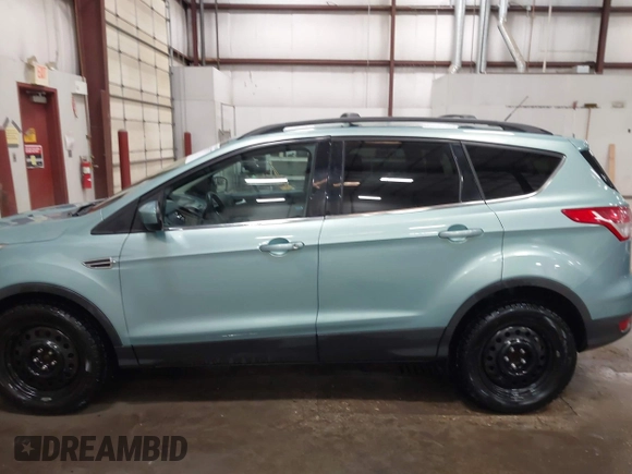 2013 Ford Escape SE with VIN 1FMCU0GX9DUB40739, listed as a IAAI auction lot 41633757 with 87,522 mi miles and . Bid and sale history available at DreamBid. Image 14.