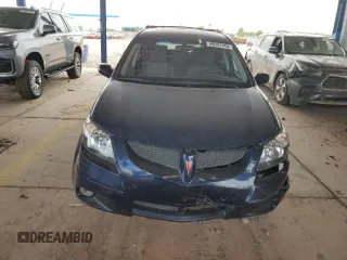 2004 Pontiac Vibe with VIN 5Y2SL62824Z459649, listed as a Copart auction lot 59057345 with 220,515 mi miles and Salvage title. Bid and sale history available at DreamBid. Image 5.