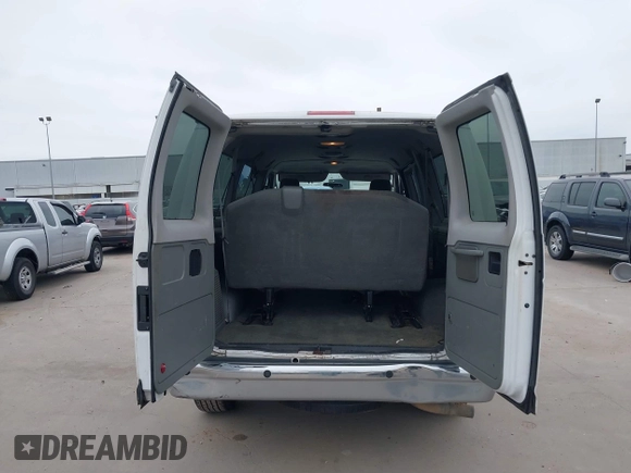 2011 Ford Econoline Passenger XL with VIN 1FBNE3BL2BDB02920, listed as a IAAI auction lot 41621713 with 270,140 mi miles. Bid and sale history available at carsss.com. Image 21.