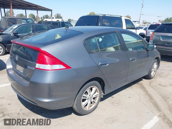 2010 Honda Insight EX with VIN JHMZE2H72AS015870, listed as a IAAI auction lot 42762384 with 58,121 mi miles and . Bid and sale history available at DreamBid. Image 4.