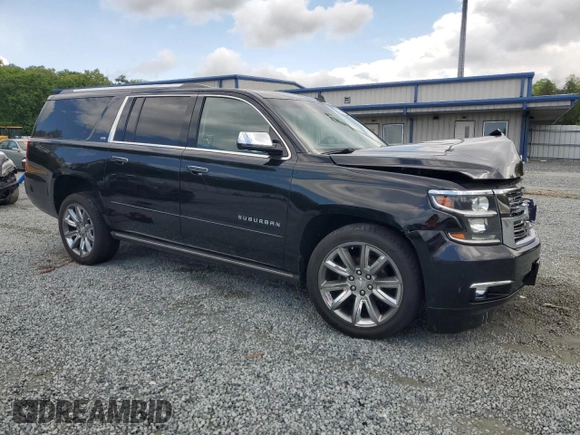 2015 Chevrolet Suburban LTZ with VIN 1GNSKKKC4FR119803, listed as a Copart auction lot 51416775 with 135,366 mi miles and Salvage Title. Bid and sale history available at DreamBid. Image 4.