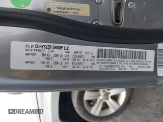 2014 Jeep Patriot Latitude with VIN 1C4NJRFB6ED778433, listed as a IAAI auction lot 41211522 with 127,506 mi miles. Bid and sale history available at carsss.com. Image 9.