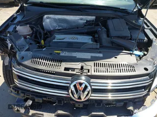 2015 Volkswagen Tiguan SE with VIN WVGAV7AX8FW595806, listed as a IAAI auction lot 42644395 with 51,638 mi miles and . Bid and sale history available at DreamBid. Image 10.