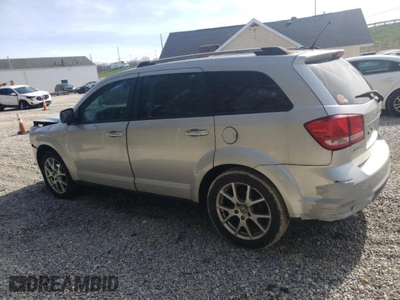 2011 Dodge Journey Crew with VIN 3D4PG3FGXBT571987, listed as a Copart auction lot 53959565 with 152,716 mi miles and Salvage title. Bid and sale history available at DreamBid. Image 2.