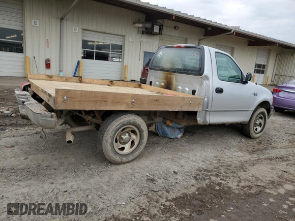 2004 Ford F-150 XL z VIN 2FTRF18274CA75519, wystawiony jako Copart lot #47450395 z przebiegiem 129 099 mil mil oraz Szkoda całkowita • Salvage title. Historia ofert i sprzedaży dostępna na DreamBid. Obrazek 3.