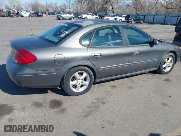 2003 Ford Taurus SE Standard with VIN 1FAFP53U03G240491, listed as a IAAI auction lot 41967252 with 191,151 mi miles. Bid and sale history available at carsss.com. Image 4.