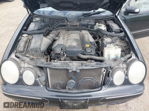 2002 Mercedes-Benz E-Class with VIN WDBJF65J52B496832, listed as a IAAI auction lot 42202331 with 156,304 mi miles. Bid and sale history available at carsss.com. Image 10.