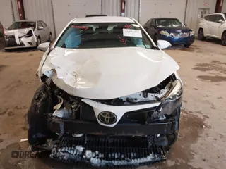 2019 Toyota Corolla L with VIN 2T1BURHE3KC132647, listed as a IAAI auction lot 42005289 with 34,077 mi miles and . Bid and sale history available at DreamBid. Image 12.
