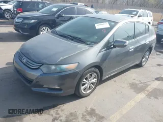 2010 Honda Insight EX with VIN JHMZE2H71AS032532, listed as a IAAI auction lot 41988221 with 333,144 mi miles and . Bid and sale history available at DreamBid. Image 2.