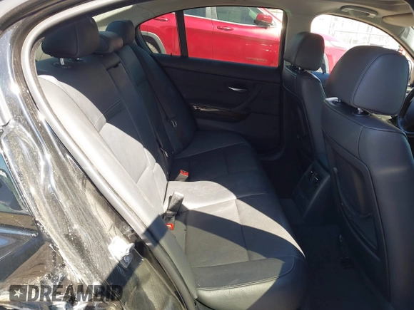 2009 BMW 3 Series 328i with VIN WBAPH57559NL77104, listed as a IAAI auction lot 41707276 with 146,170 mi miles and . Bid and sale history available at DreamBid. Image 8.