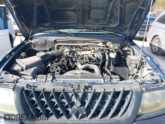 2002 Mitsubishi Montero ES z VIN JA4LS21H02J040318, wystawiony jako IAAI lot #41272566 z przebiegiem 278 339 mil mil oraz . Historia ofert i sprzedaży dostępna na DreamBid. Obrazek 10.