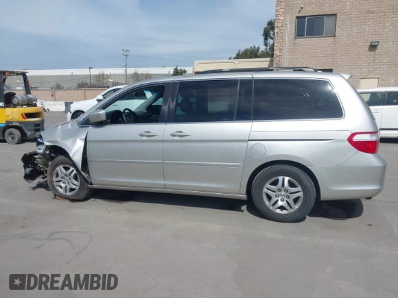 2006 Honda Odyssey EX-L z VIN 5FNRL38736B089963, wystawiony jako IAAI lot #41858061 z przebiegiem 178 845 mil mil oraz . Historia ofert i sprzedaży dostępna na DreamBid. Obrazek 14.
